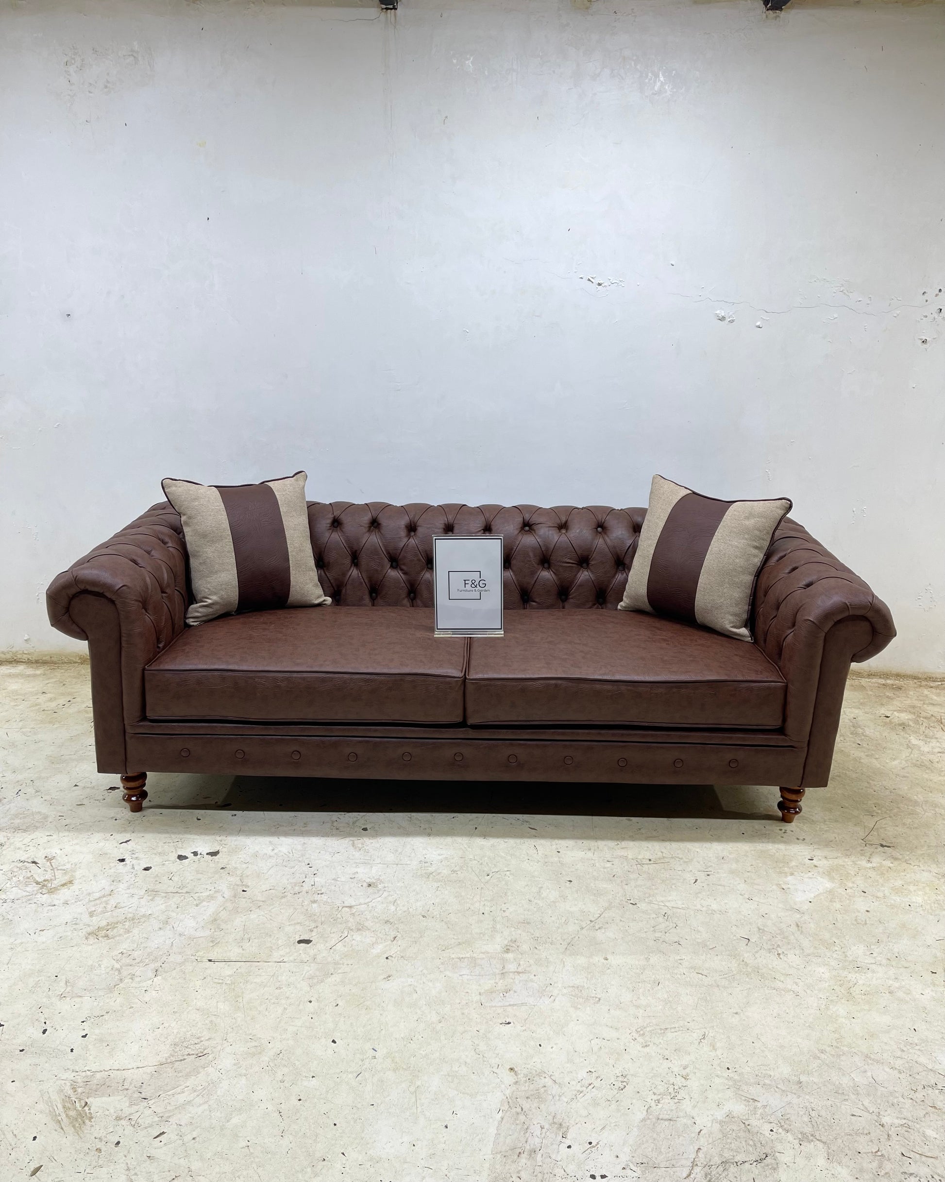 The Victoria Chesterfield Sofa in leather fabric
