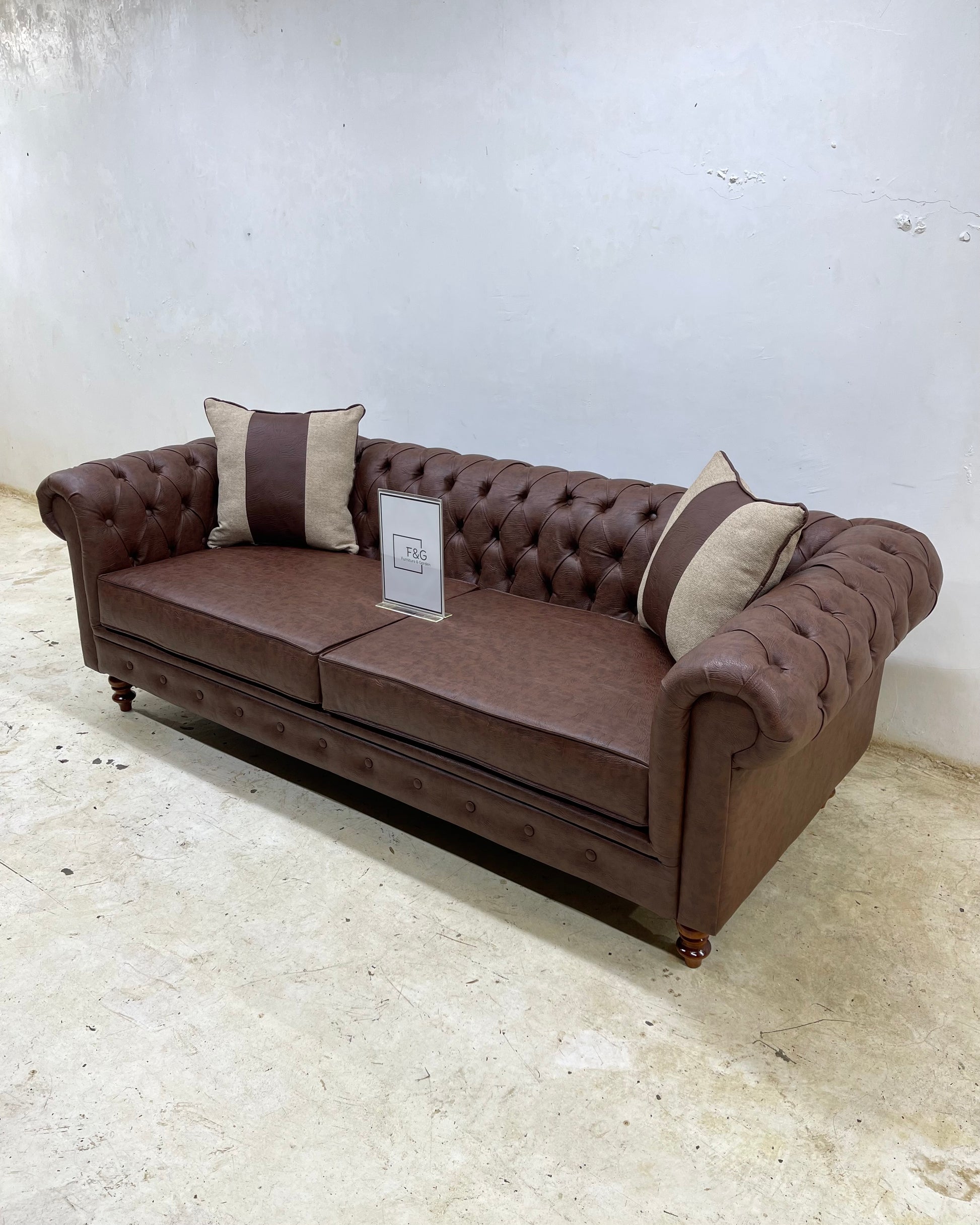 The Victoria Chesterfield Sofa in leather fabric